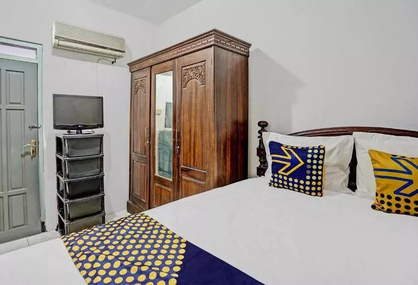 ホテル Spot On 92595 Umi Homestay Syariah