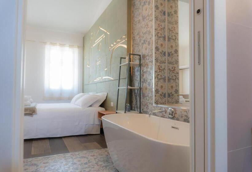 تختخواب و صبحانه Rudini  Charming