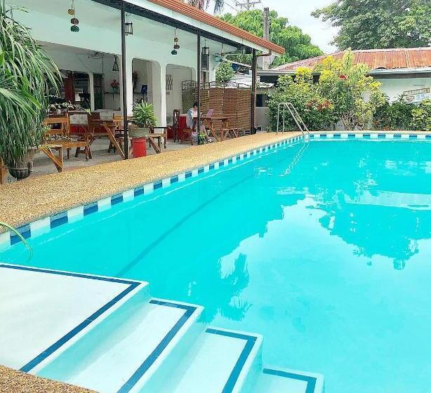 בית מלון כפרי Eve S Kiosk Dive Resort