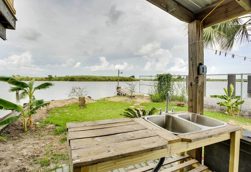 Golden Meadow Getaway: Waterfront Retreat W/ Deck