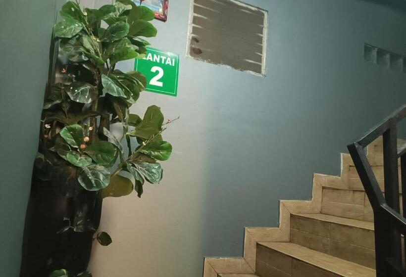 호텔 Oyo 93117 Penginapan Tiga Dara