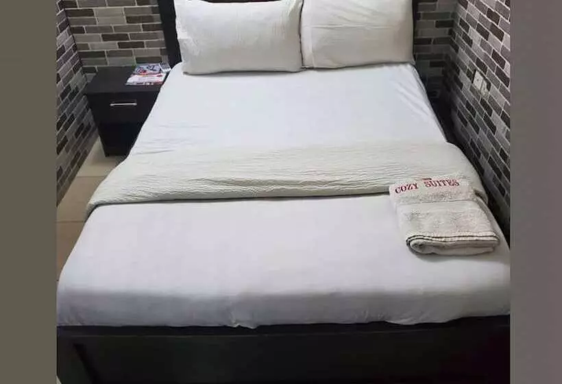 هتل Cozy Suites