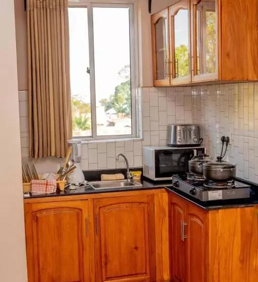 تختخواب و صبحانه Riverpoint Inn, Arusha
