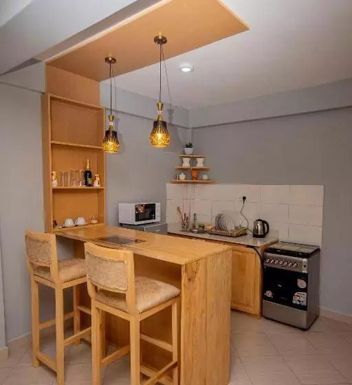 تختخواب و صبحانه Riverpoint Inn, Arusha