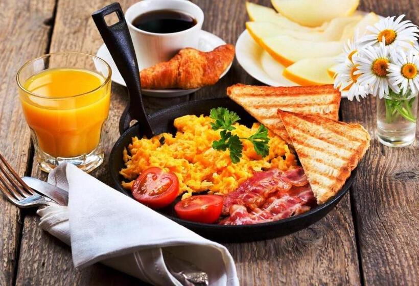 ホテル Fabexpress Morjim Sea Waves