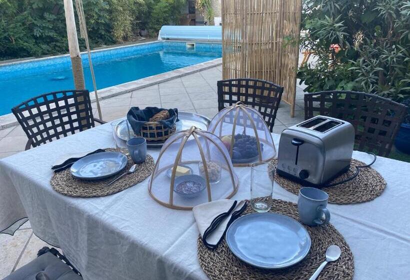 تختخواب و صبحانه Le Patio Aux Oiseaux