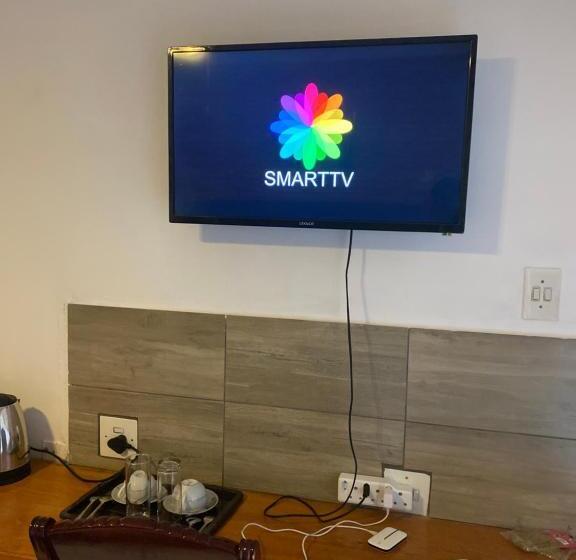 ペンション Comrades Oasis Guest House