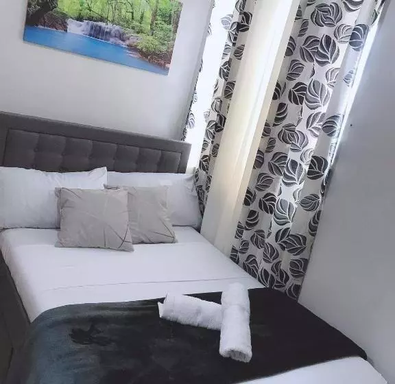 استراحتگاه J&r Staycation Smdc Trees Residences