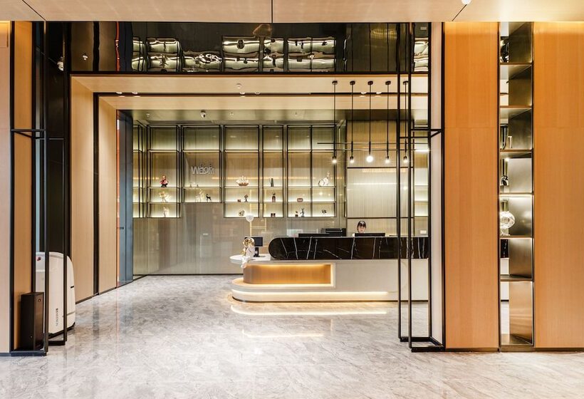 호텔 Mantuolunplusjiudian