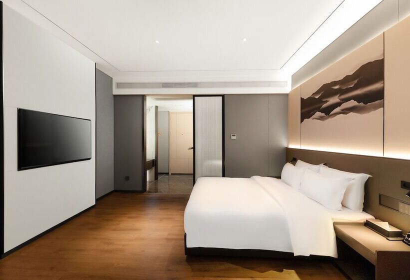 호텔 Mantuolunplusjiudian