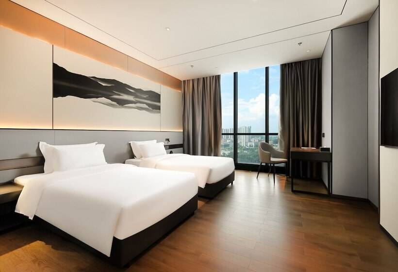 호텔 Mantuolunplusjiudian