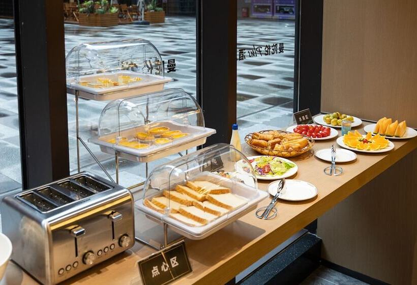 호텔 Mantuolunplusjiudian