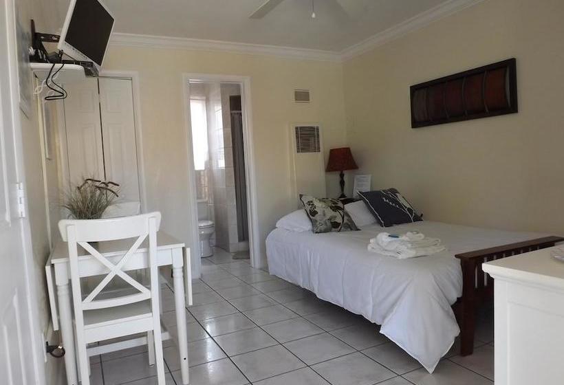 فندق Eamon James Apartments & Suites