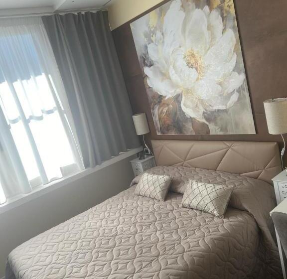 تختخواب و صبحانه La Dea Bendata