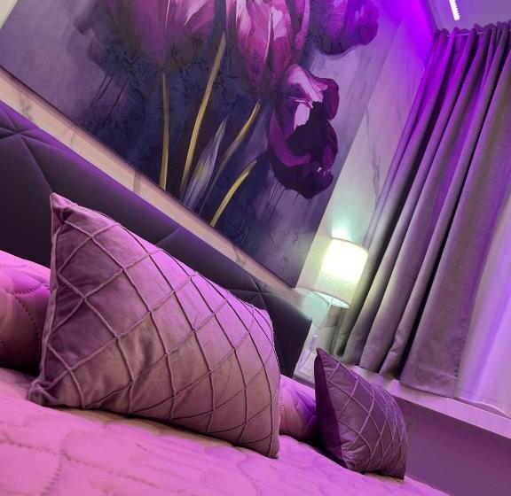 تختخواب و صبحانه La Dea Bendata