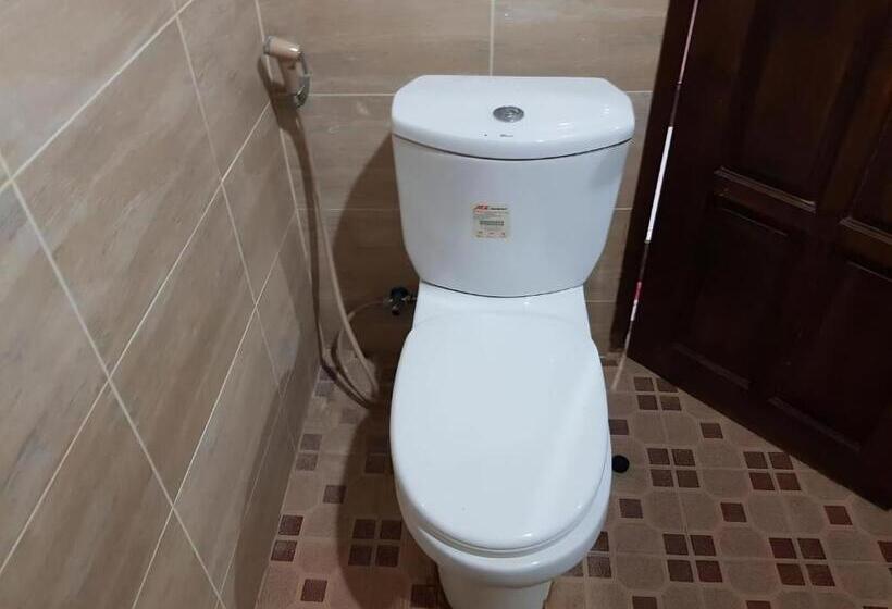 בית מלון כפרי Oyo 93443 Emmy Homestay Syariah