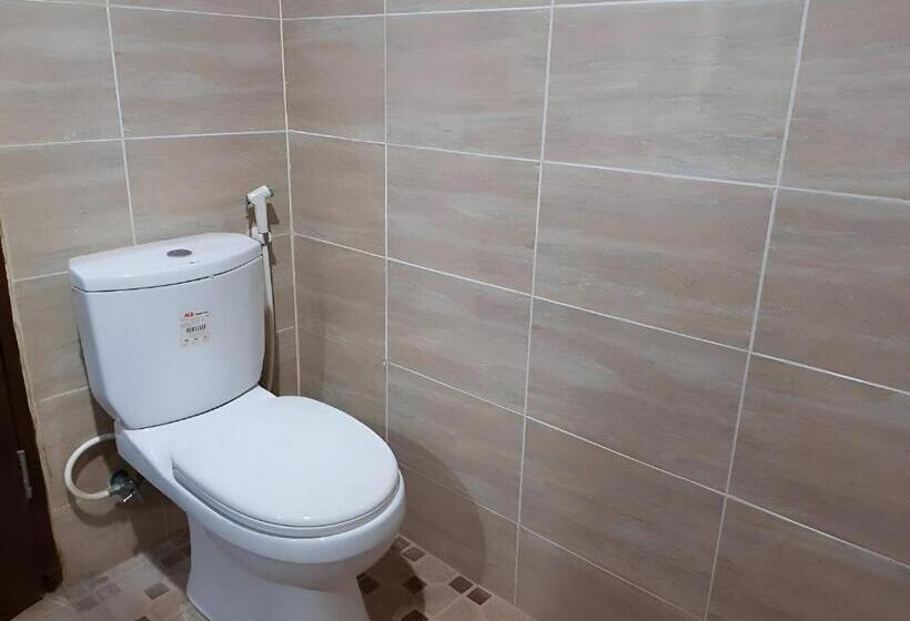 בית מלון כפרי Oyo 93443 Emmy Homestay Syariah