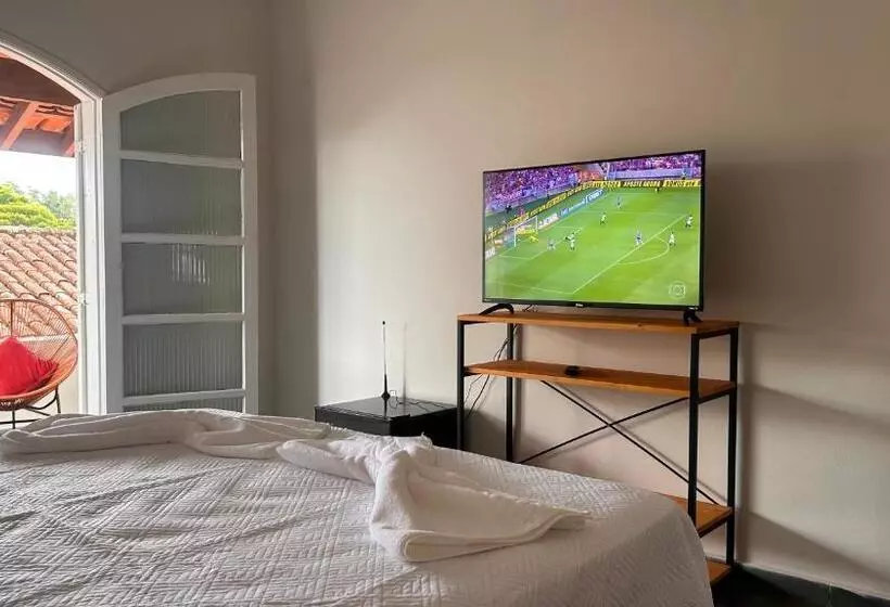 تختخواب و صبحانه Suítes Aqui é Seu Lugar Itaguá