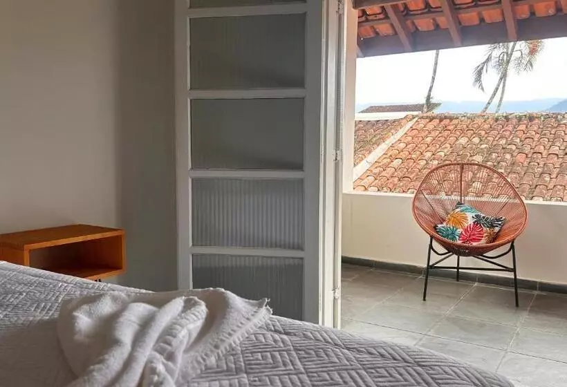 تختخواب و صبحانه Suítes Aqui é Seu Lugar Itaguá