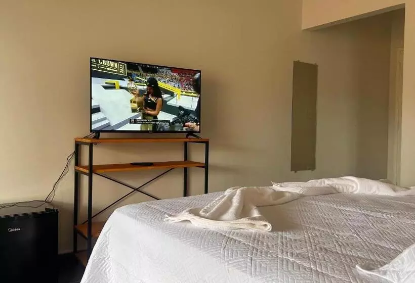 تختخواب و صبحانه Suítes Aqui é Seu Lugar Itaguá