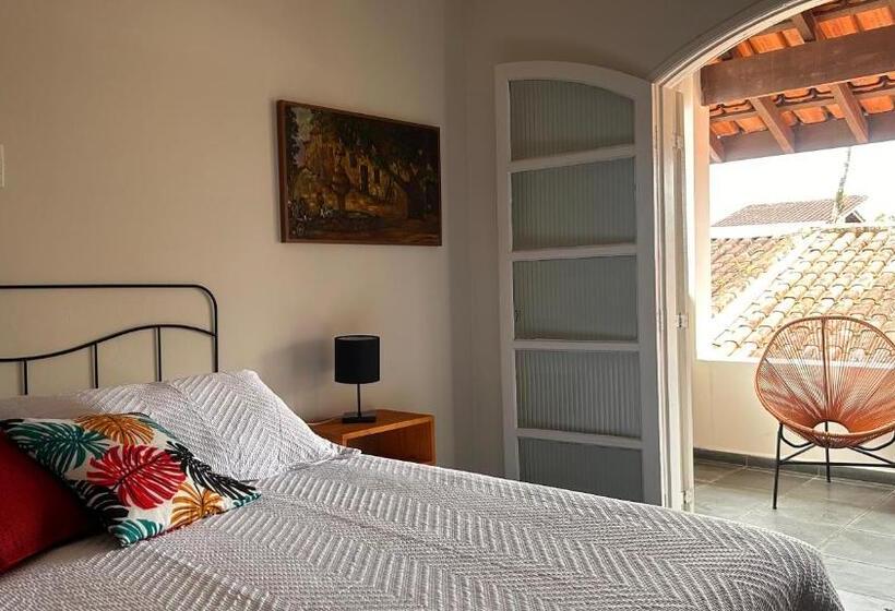 تختخواب و صبحانه Suítes Aqui é Seu Lugar Itaguá