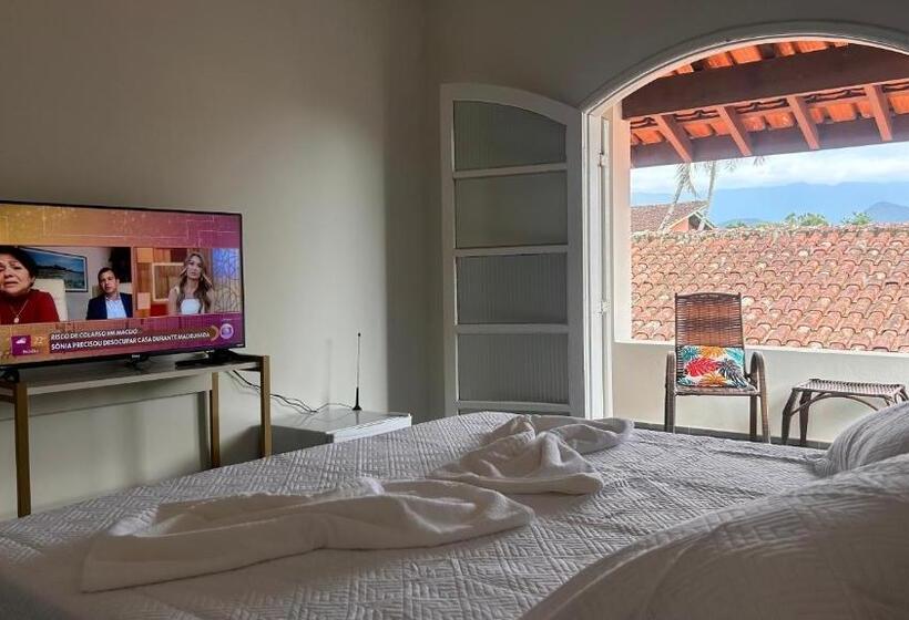 تختخواب و صبحانه Suítes Aqui é Seu Lugar Itaguá