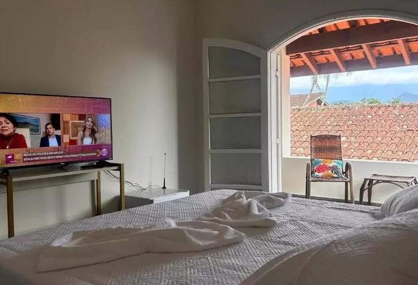 تختخواب و صبحانه Suítes Aqui é Seu Lugar Itaguá