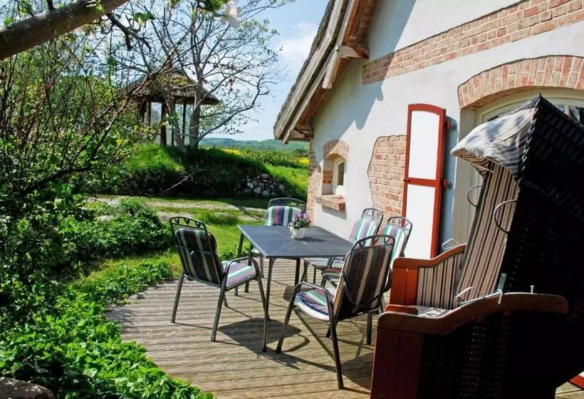 ホテル Ferienhaus Unterm Reetdach