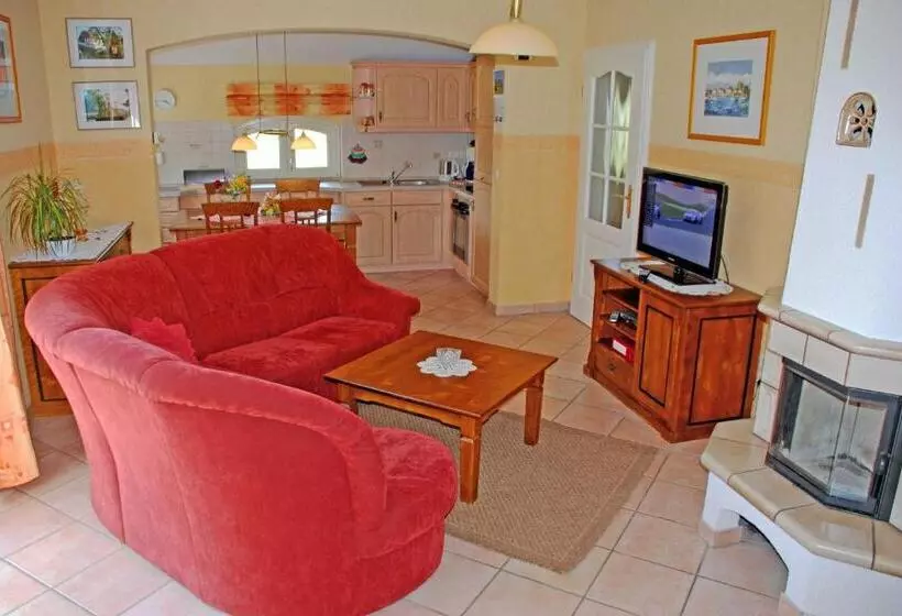 ホテル Ferienhaus Unterm Reetdach