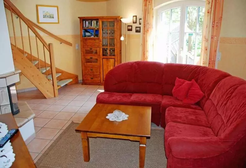 ホテル Ferienhaus Unterm Reetdach