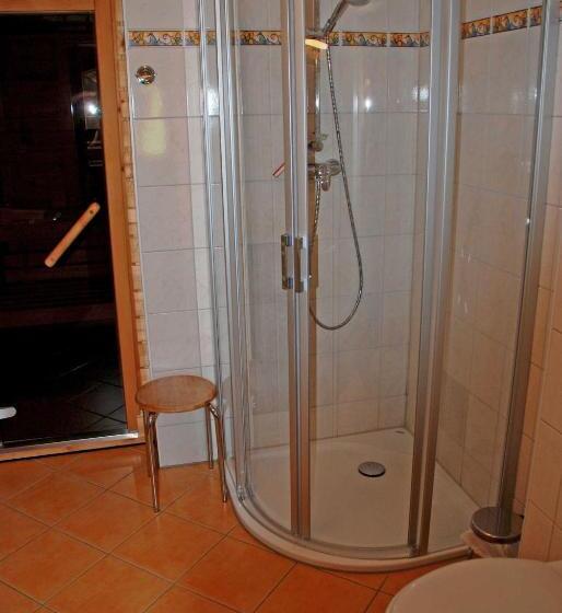 Отель Ferienhaus Unterm Reetdach