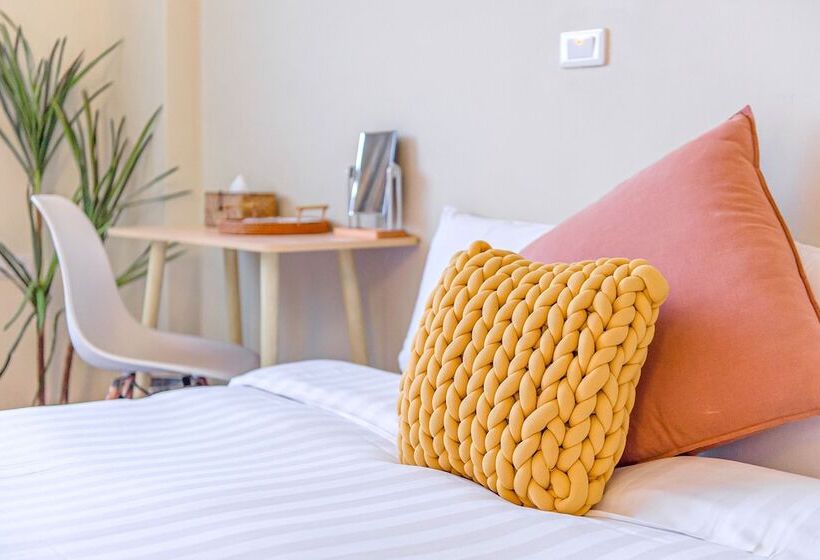 تختخواب و صبحانه H& 嶼光風格旅店 L 彩虹石榴 L 囍福園閤