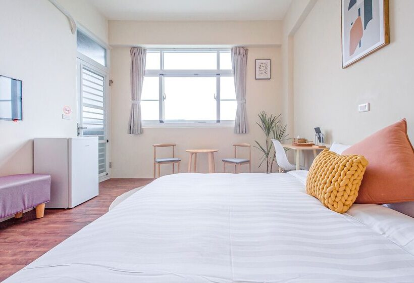 تختخواب و صبحانه H& 嶼光風格旅店 L 彩虹石榴 L 囍福園閤