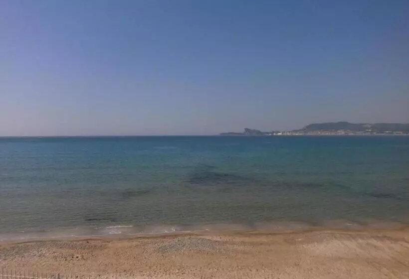 هتل Au Tapis De Sable