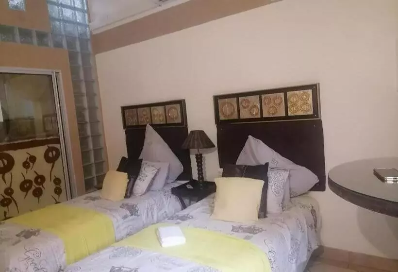پانسیون Texas Suites