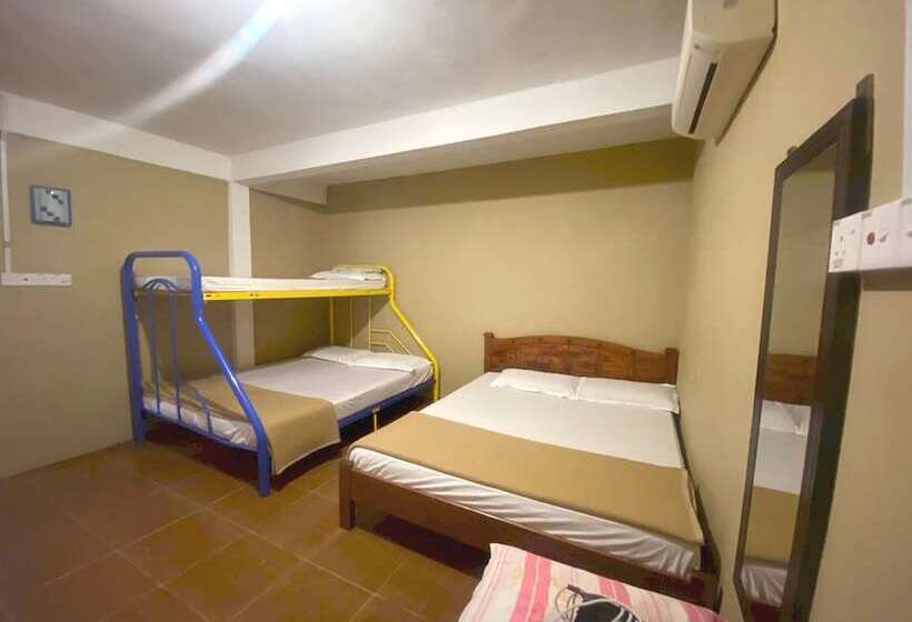 Отель Oyo 90910 Homestay D Lalang Inn