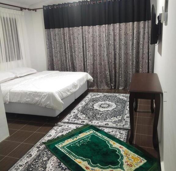 فندق Nor@az Roomestay