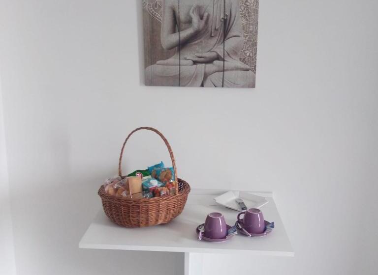 تختخواب و صبحانه La Staccionata Bianca