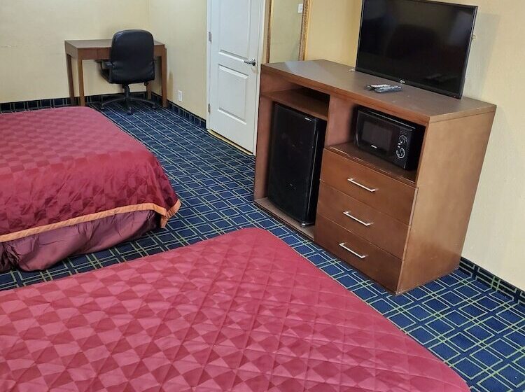 Мотель Delmonico Inn & Suites