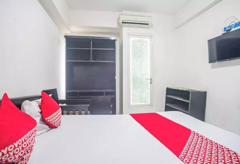 Hotelli Oyo 94083 Apartemen Podomoro Golf View Victory Rooms