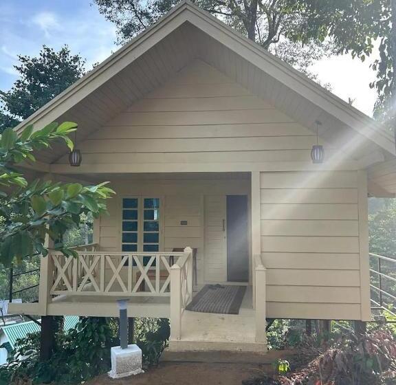 فندق Coffee Green Cottages