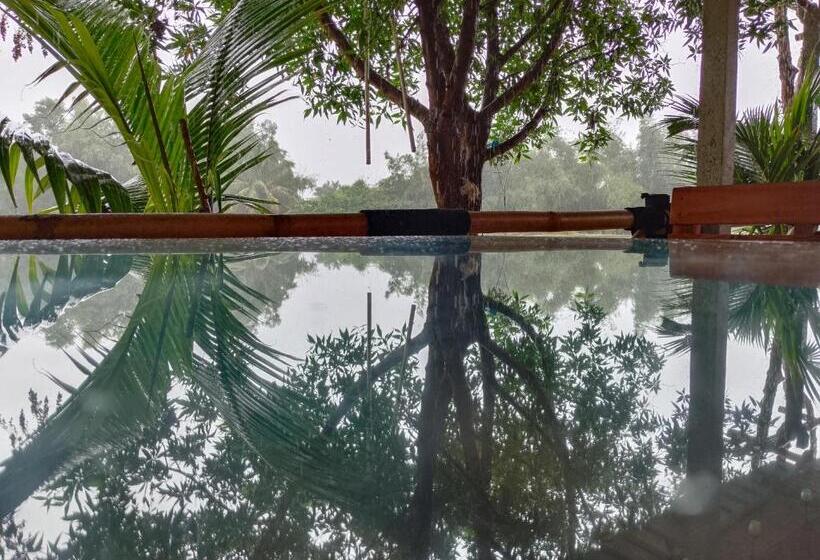 호텔 Hampi Waterfall Cottages