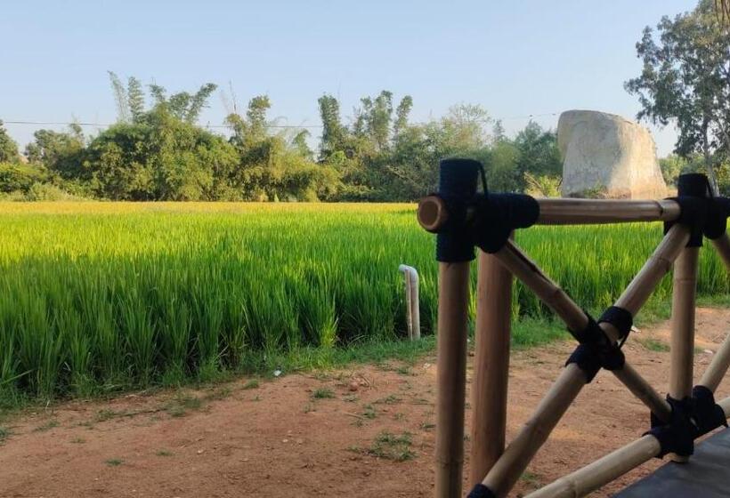 호텔 Hampi Waterfall Cottages