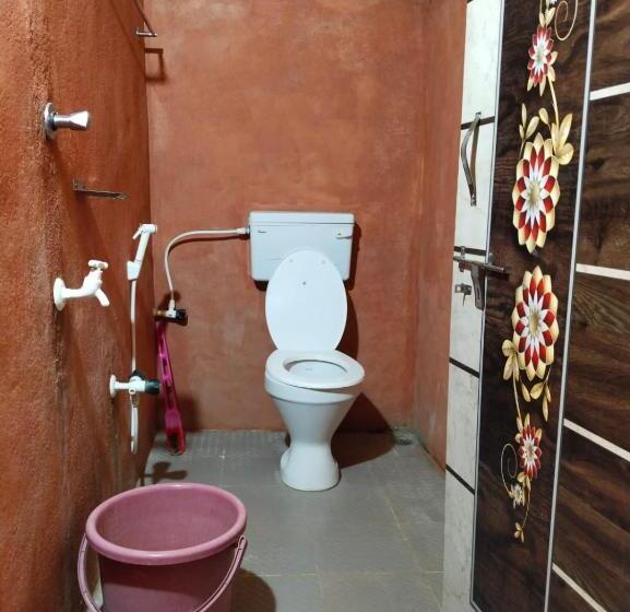 호텔 Hampi Waterfall Cottages