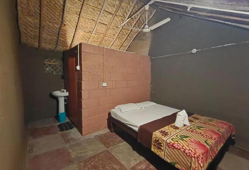 호텔 Hampi Waterfall Cottages