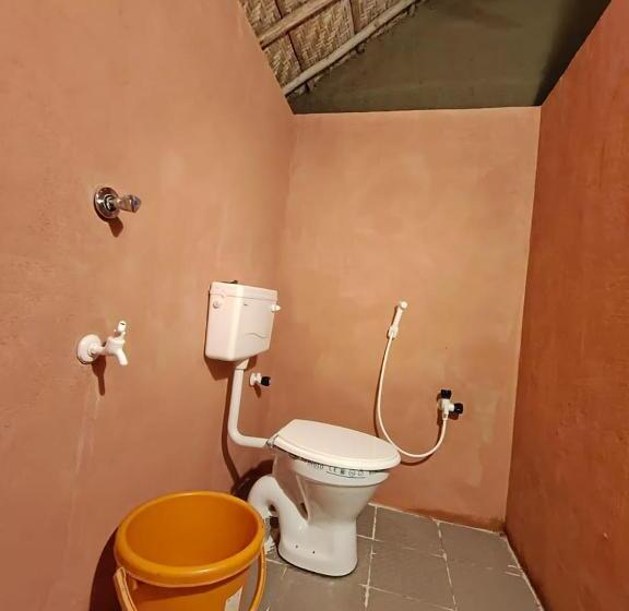 호텔 Hampi Waterfall Cottages