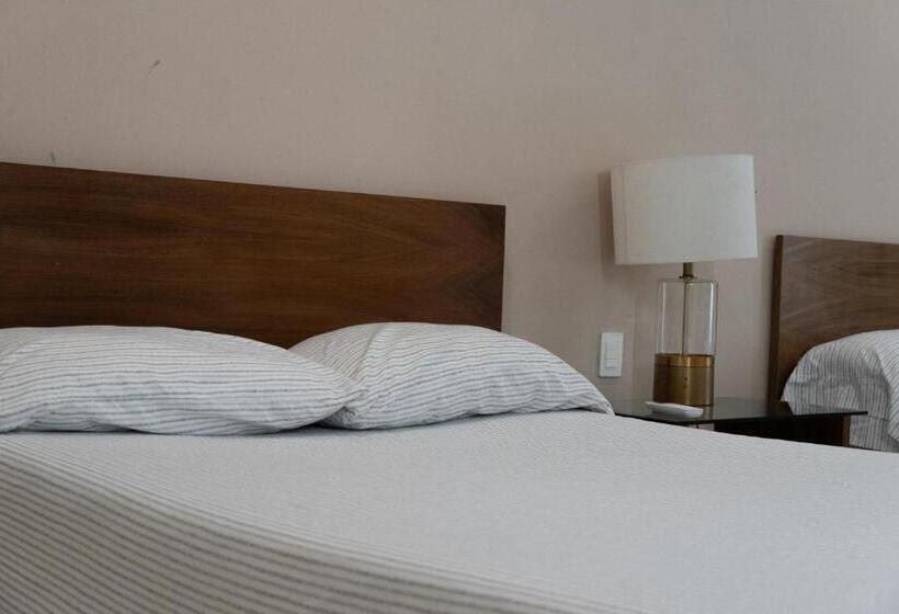 Infinity Suites Habitación Triple 103