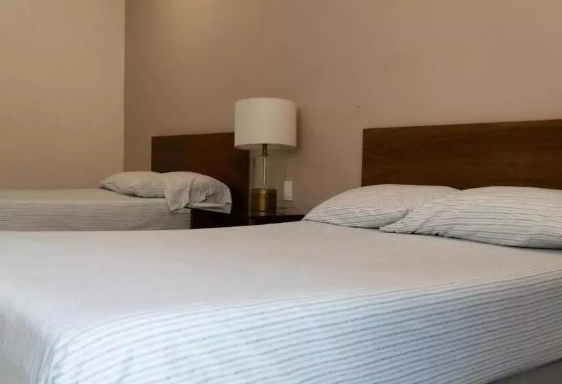 Infinity Suites Habitación Triple 103