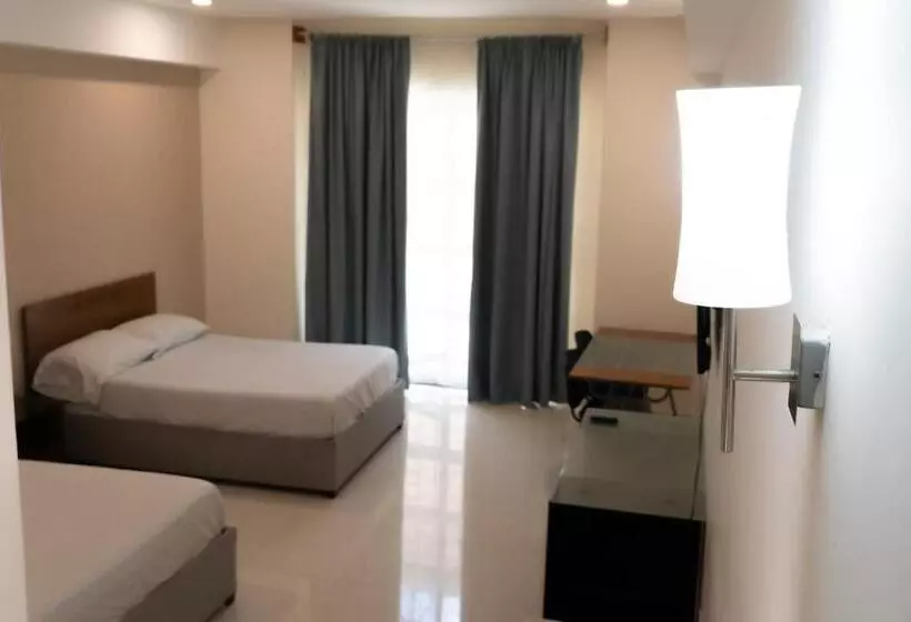 Infinity Suites Habitación Triple 103