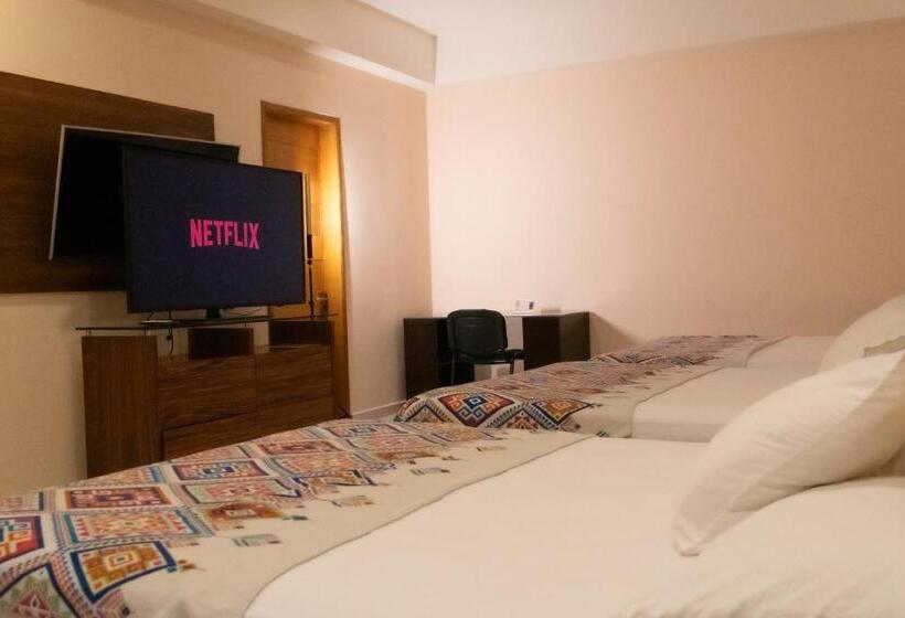 Infinity Suites Habitación Triple 211